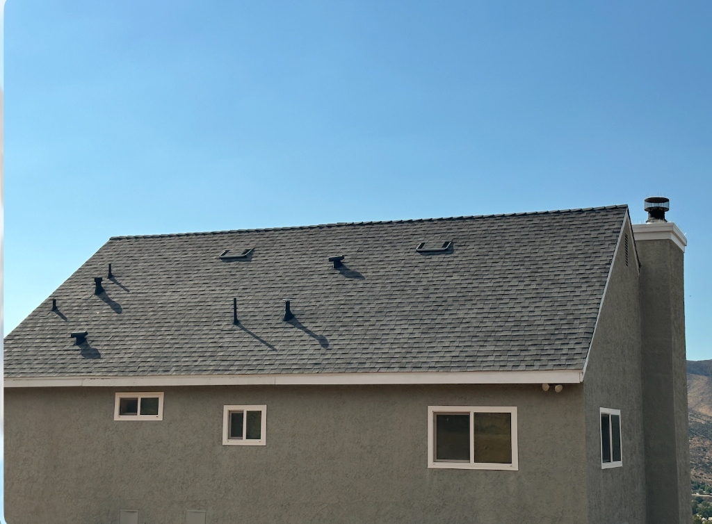 Two-Story Upper Roof Plane & Stucco Chimney Integration