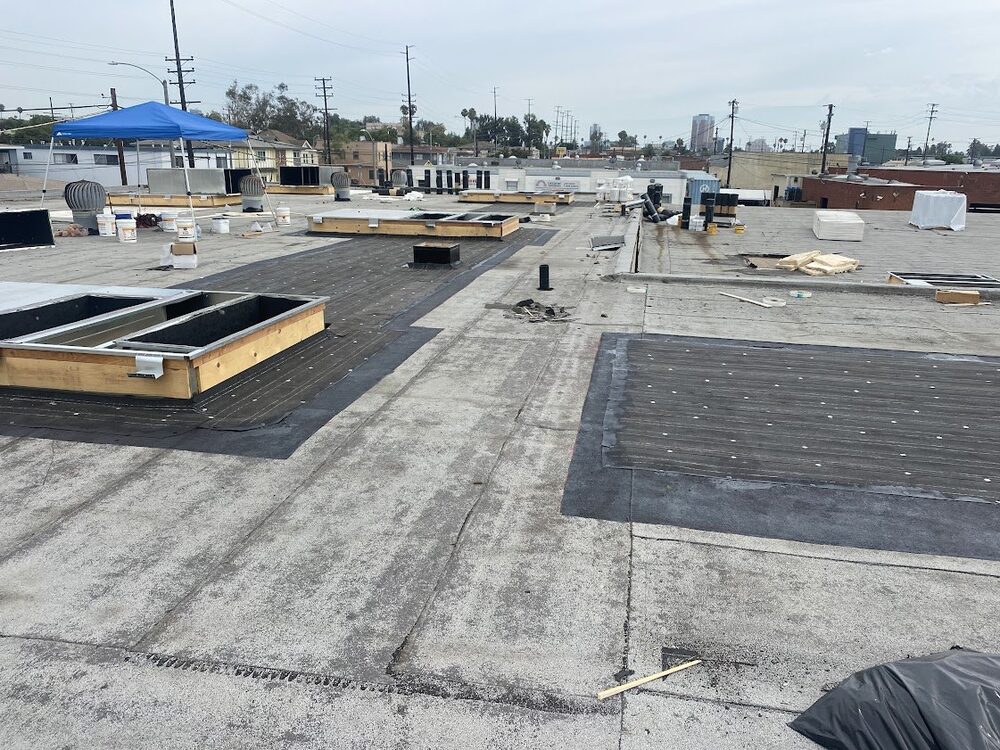 Monolithic Parapet Flashing & Scupper Integration